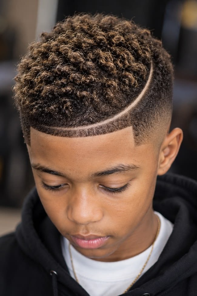 Short brown hair style inspiration on a client at Culture Kutz Nyali